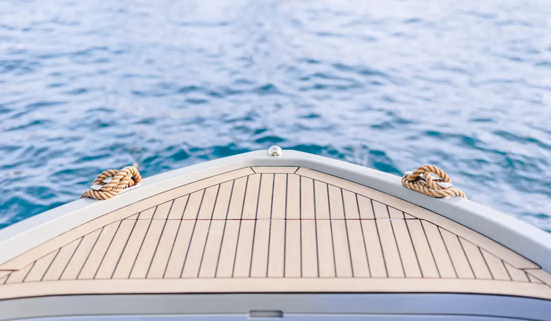 Teak foredeck with mooring lines