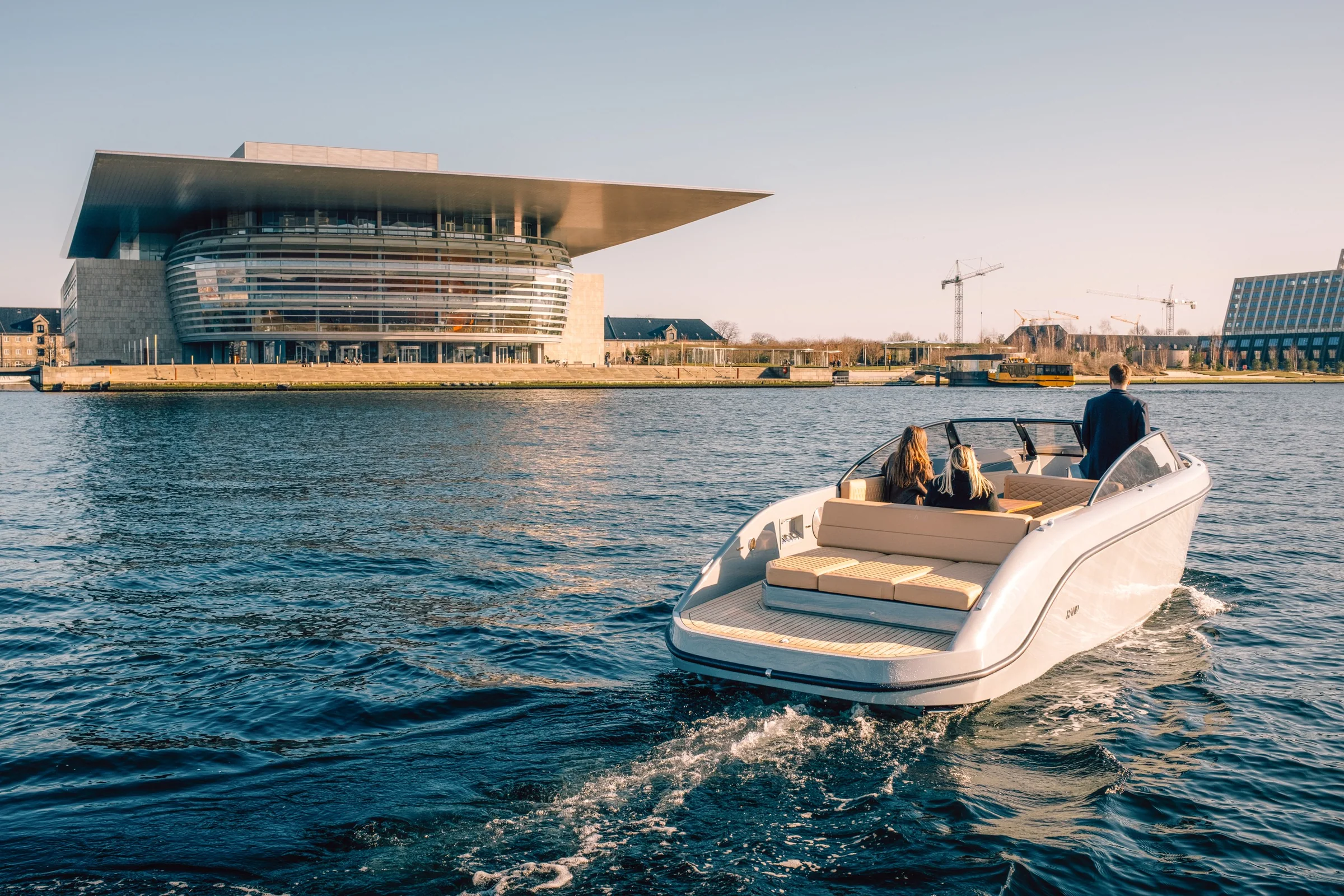 Guests aboard a RAND in front of the Copenhagen Opera House
