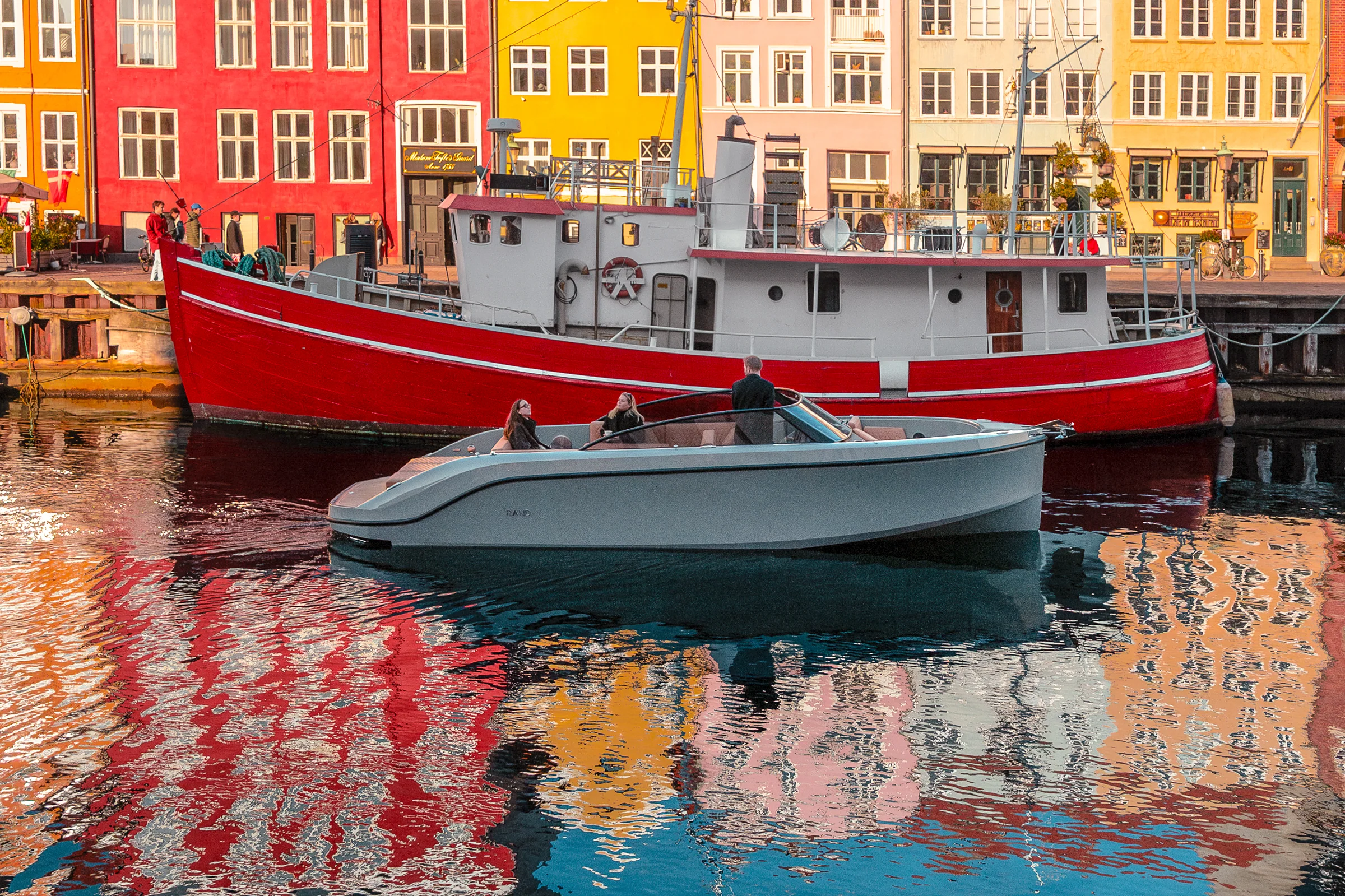 A RAND passing the coloured houses of Nyhavn