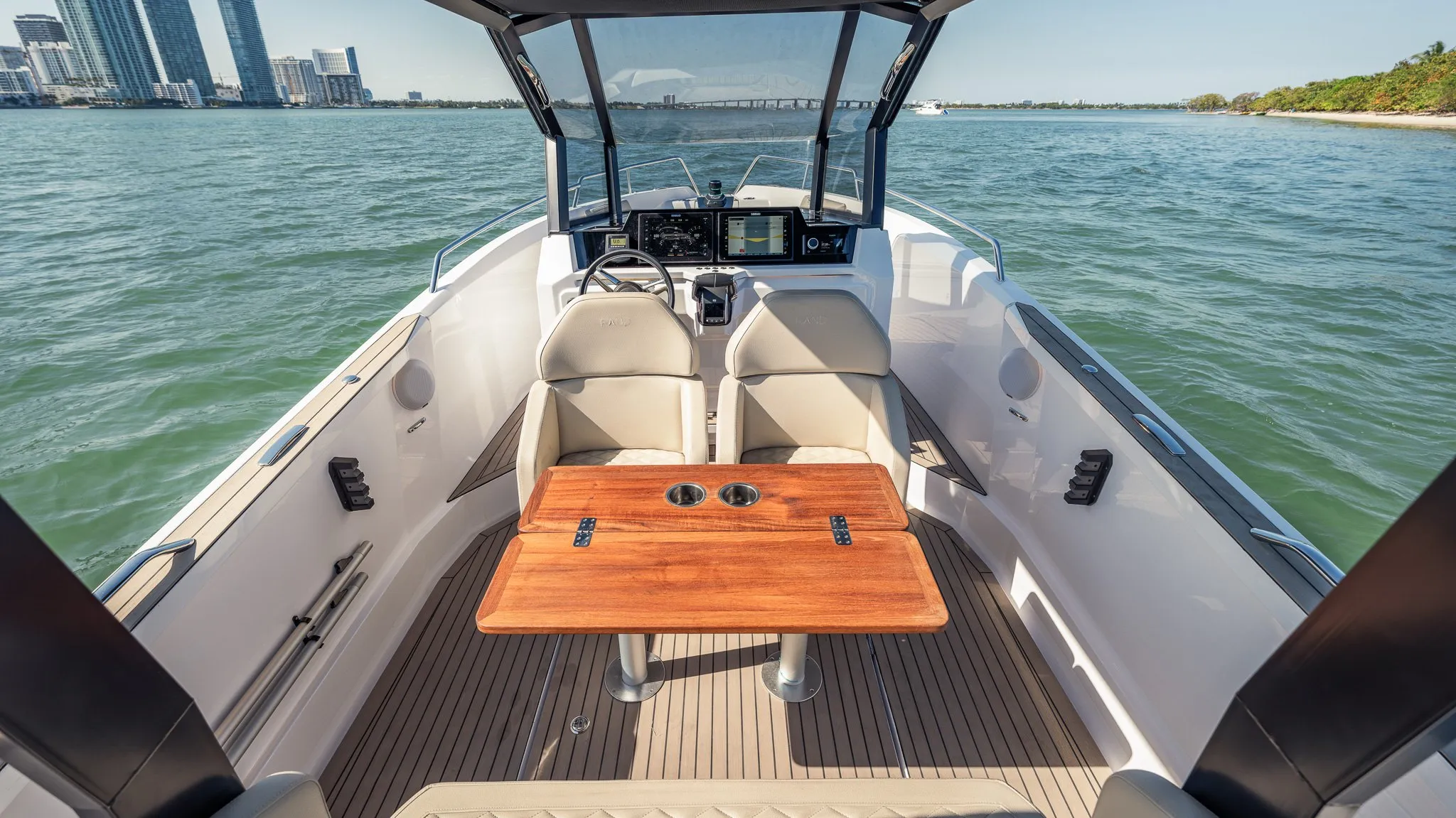 Teak table and helm seats aboard Escape 29