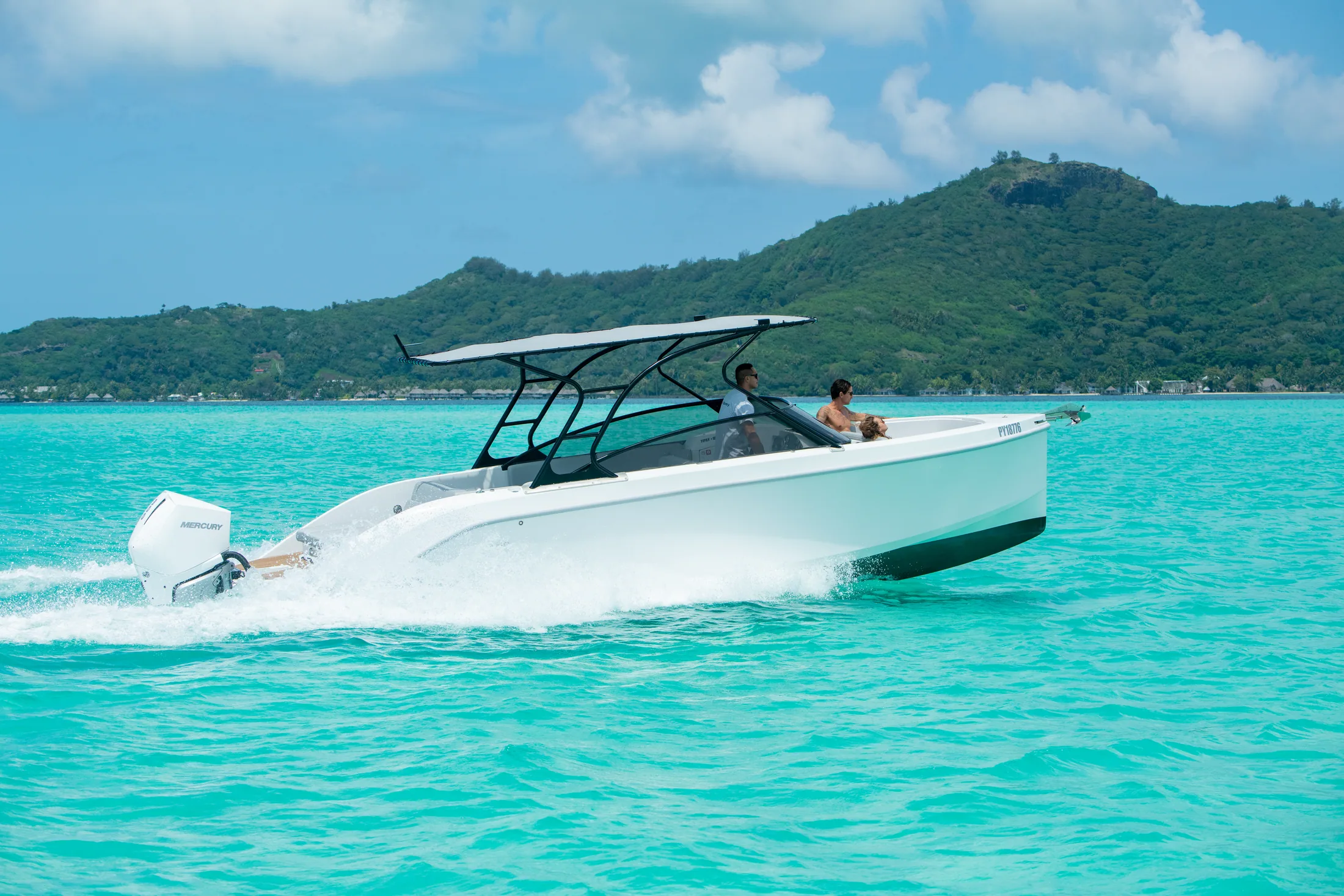 Supreme 27 running through a turquoise lagoon