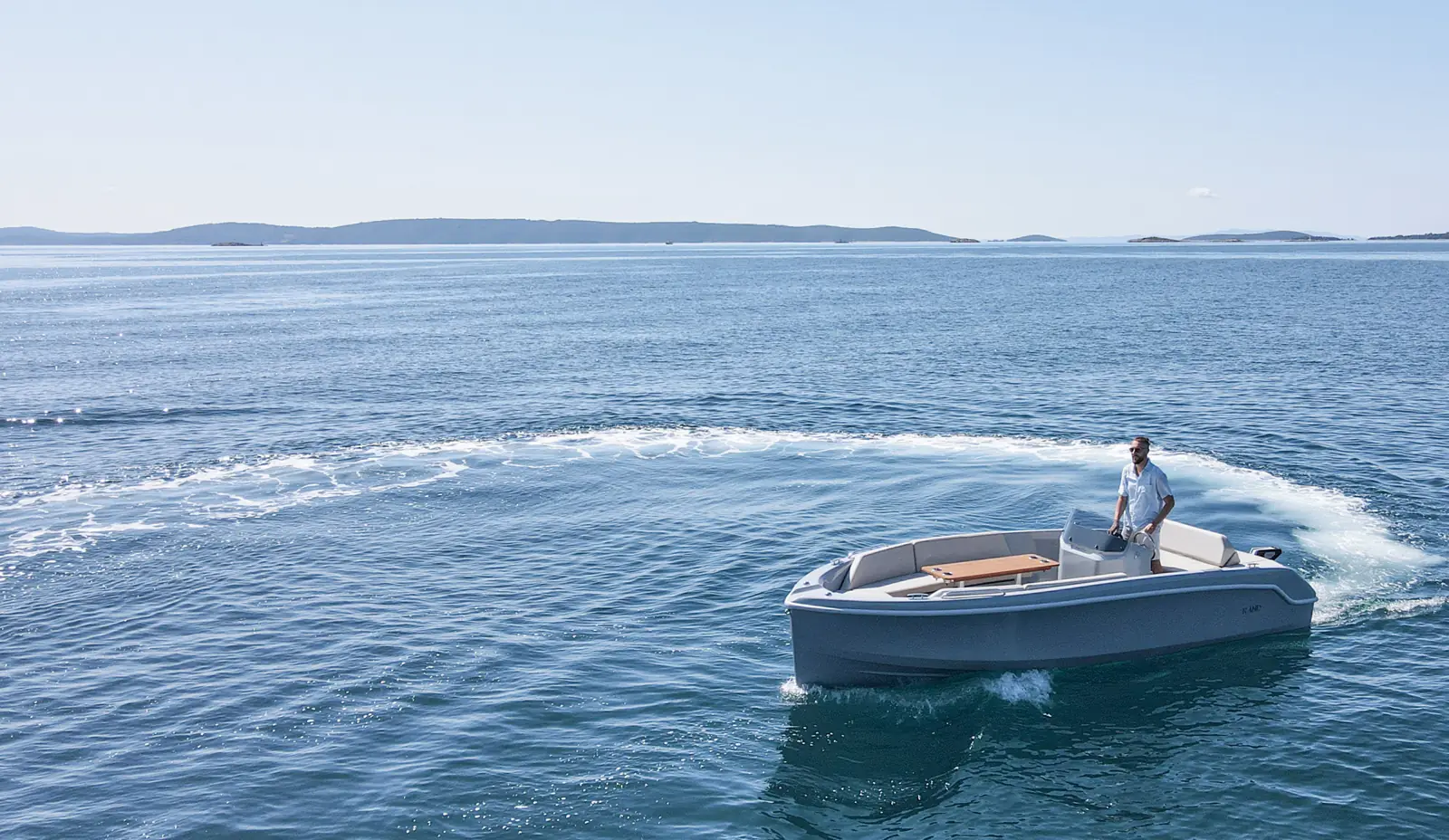 A RAND idling on calm open water